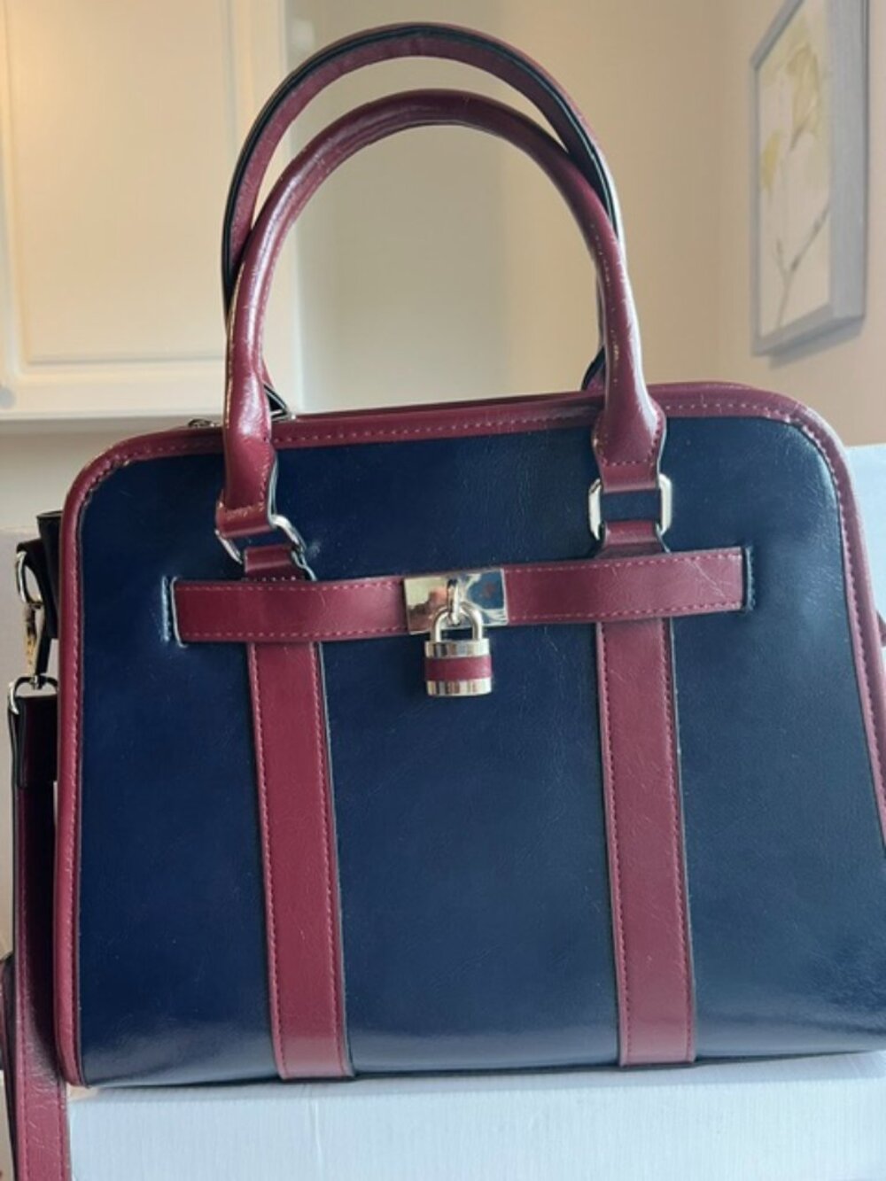 Cleo two-tone PU leather satchel bag.